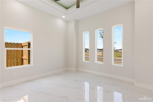 spare room with ceiling fan