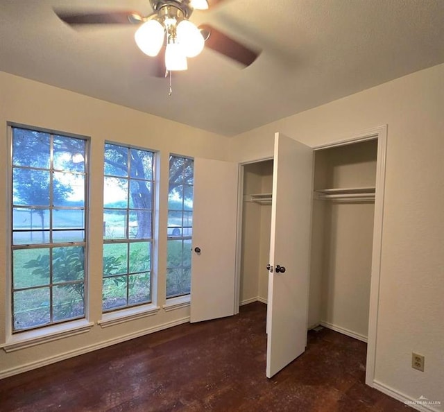 unfurnished bedroom with ceiling fan