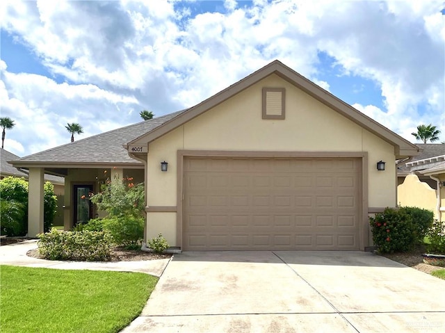 ranch-style house featuring a garage