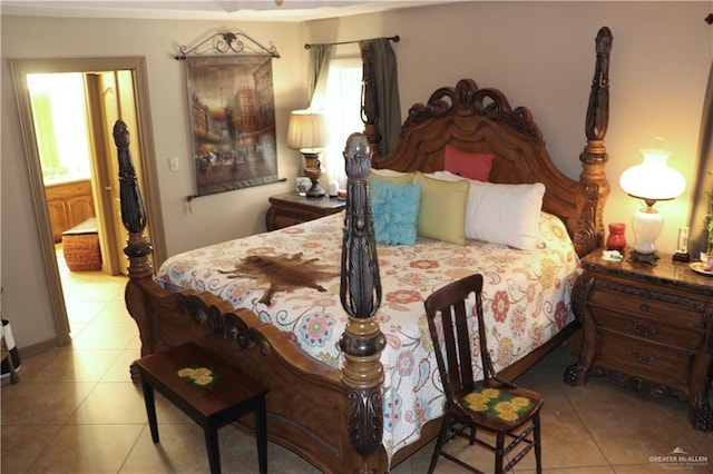 bedroom featuring light tile patterned floors