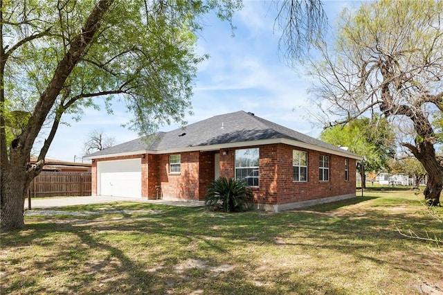 single story home with a garage and a front yard