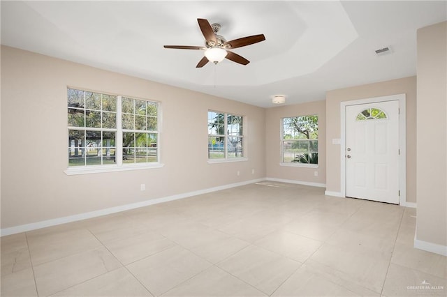 tiled foyer entrance featuring ceiling fan