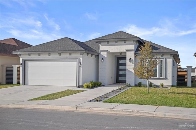 view of front of home with roof with shingles, stucco siding, concrete driveway, an attached garage, and a front yard