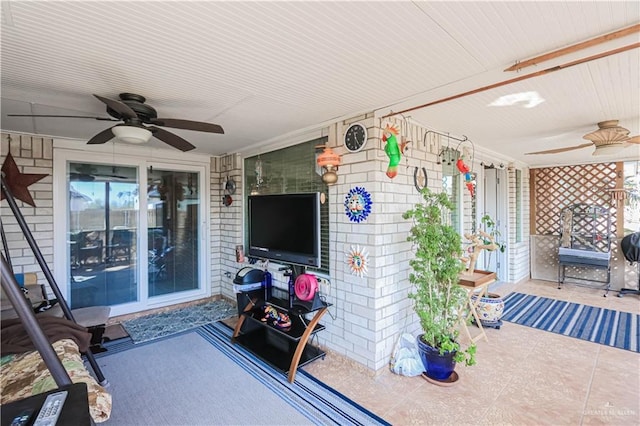 view of patio / terrace featuring ceiling fan