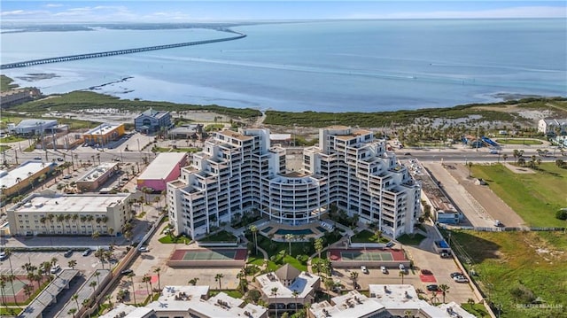 birds eye view of property with a water view