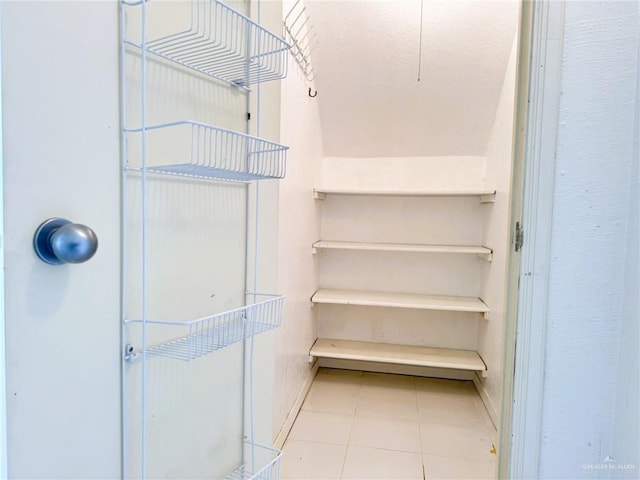 interior space featuring light tile patterned floors