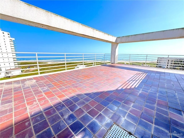 view of patio / terrace with a water view