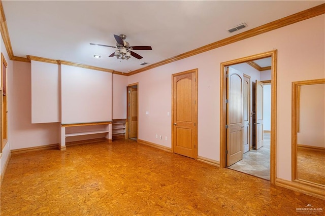 empty room featuring crown molding and ceiling fan