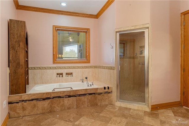 bathroom with separate shower and tub and ornamental molding