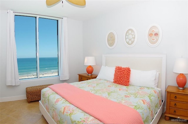 310A Padre Blvd Unit 1305, South Padre Island, TX 78597 - bedroom featuring baseboards and a ceiling fan