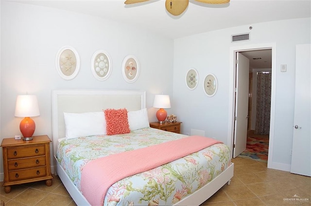 310A Padre Blvd Unit 1305, South Padre Island, TX 78597 - bedroom with tile patterned floors and ceiling fan