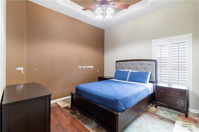 2428 Christina Ave, Mission, TX 78572 - bedroom with hardwood / wood-style floors, a raised ceiling, and ceiling fan