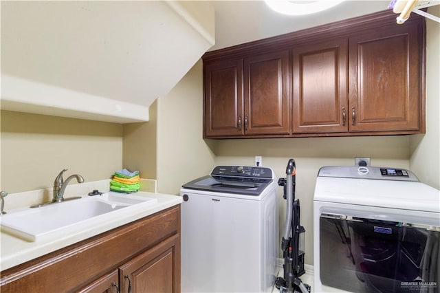 2428 Christina Ave, Mission, TX 78572 - laundry room with cabinets, washer and dryer, and sink