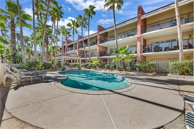 view of pool featuring a patio