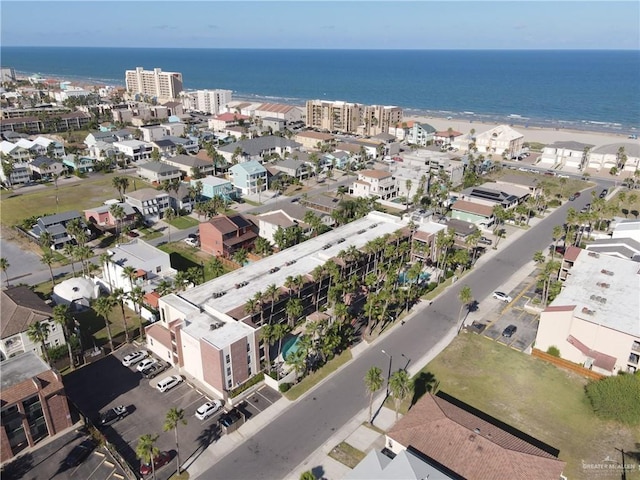 drone / aerial view with a view of the beach and a water view