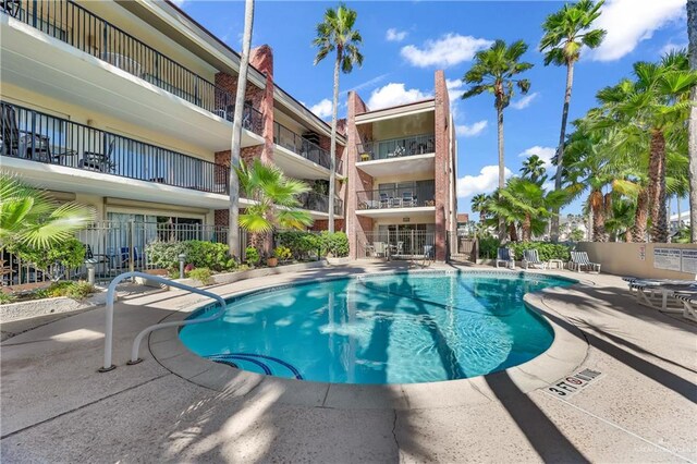 110 Verna Jean Dr Unit 110, South Padre Island, TX 78597 - community pool featuring a patio area