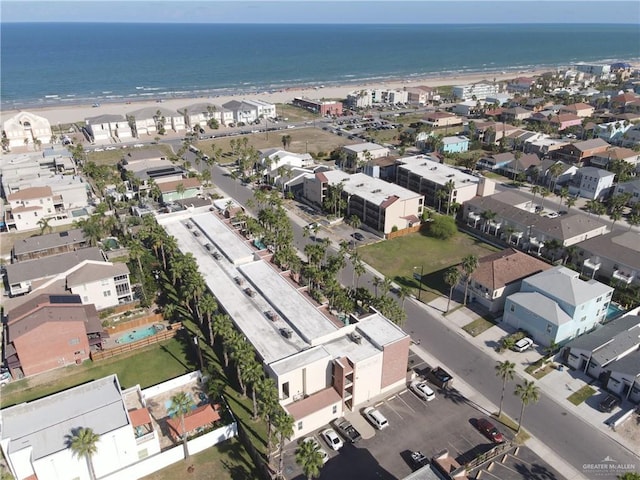 aerial view with a view of the beach and a water view