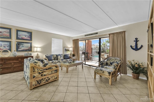 living room featuring light tile patterned flooring