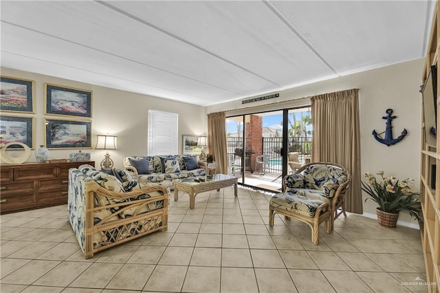 110 Verna Jean Dr Unit 110, South Padre Island, TX 78597 - living room featuring light tile patterned floors