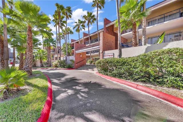 110 Verna Jean Dr Unit 110, South Padre Island, TX 78597 - view of asphalt road with curbs