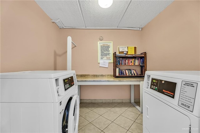 110 Verna Jean Dr Unit 110, South Padre Island, TX 78597 - shared laundry featuring separate washer and dryer, light tile patterned flooring, and a textured ceiling