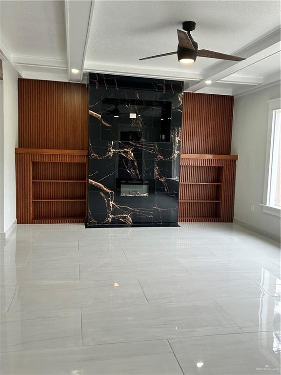 612 E Tom Landry St, Mission, TX 78572 - unfurnished living room featuring ceiling fan and beam ceiling