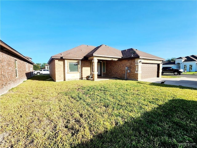 ranch-style home with a front yard and a garage