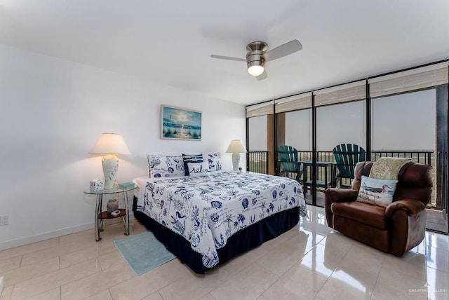 110 Padre Blvd Unit 603, South Padre Island, TX 78597 - tiled bedroom with floor to ceiling windows, baseboards, and ceiling fan