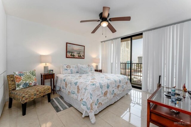 110 Padre Blvd Unit 603, South Padre Island, TX 78597 - bedroom featuring access to exterior, floor to ceiling windows, a ceiling fan, and light tile patterned flooring