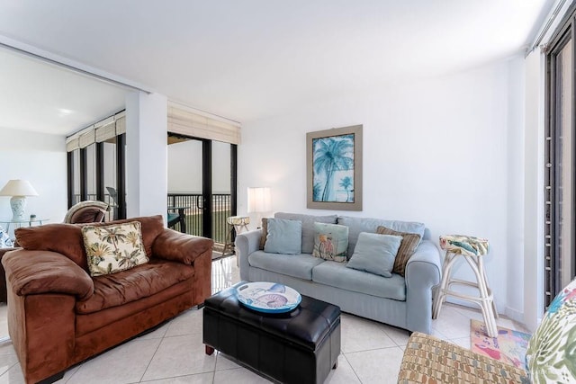 110 Padre Blvd Unit 603, South Padre Island, TX 78597 - living room with light tile patterned flooring and plenty of natural light