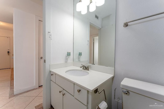 110 Padre Blvd Unit 603, South Padre Island, TX 78597 - bathroom featuring tile patterned flooring, visible vents, toilet, and vanity