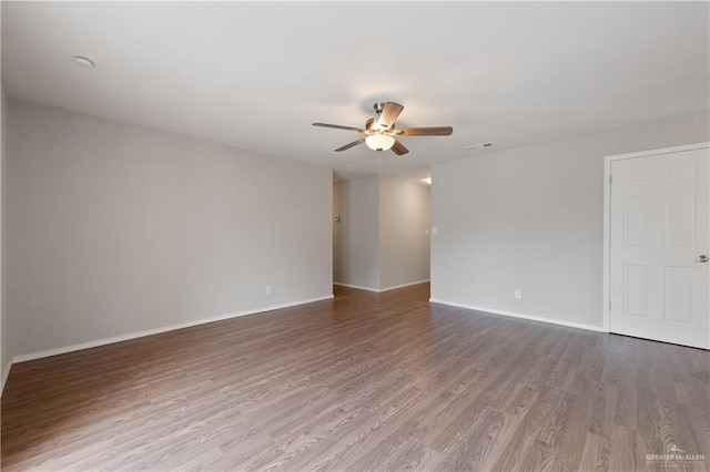 2310 Arbor St, Harlingen, TX 78552 - unfurnished room with a ceiling fan, wood finished floors, and baseboards