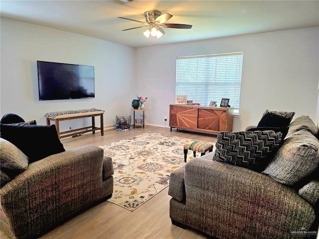1920 Katherine Ave, Edinburg, TX 78539 - living area with wood finished floors, a ceiling fan, and baseboards
