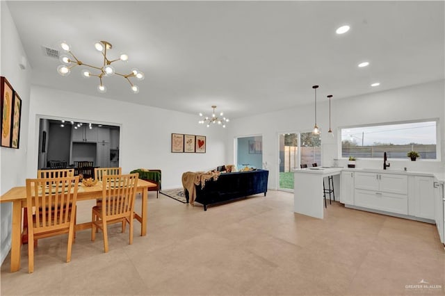 dining room with recessed lighting, visible vents, and an inviting chandelier