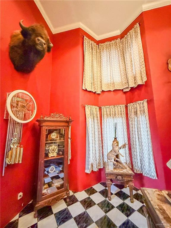 1712 N 1st St, Mcallen, TX 78501 - bathroom with ornamental molding and tile patterned floors
