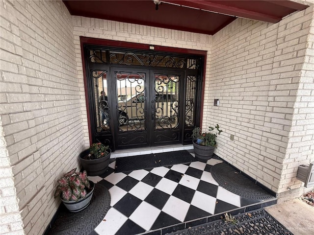 1712 N 1st St, Mcallen, TX 78501 - entrance to property with brick siding and french doors