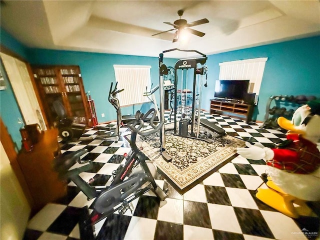 1712 N 1st St, Mcallen, TX 78501 - exercise area featuring ceiling fan, tile patterned floors, and a tray ceiling