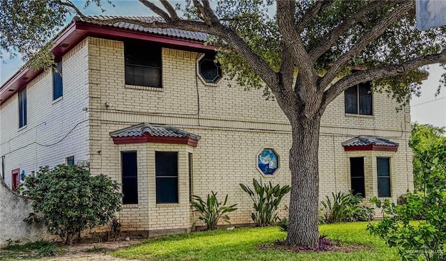 1712 N 1st St, Mcallen, TX 78501 - view of front of house featuring brick siding