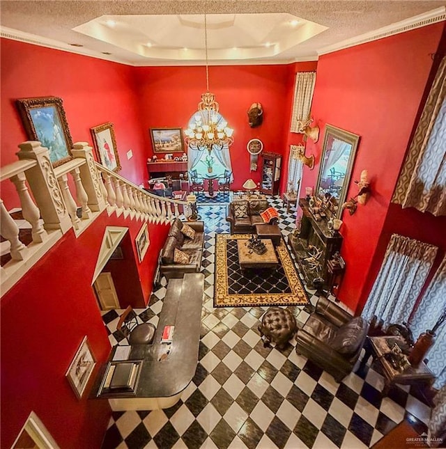 1712 N 1st St, Mcallen, TX 78501 - interior space with a tray ceiling, a chandelier, and a textured ceiling
