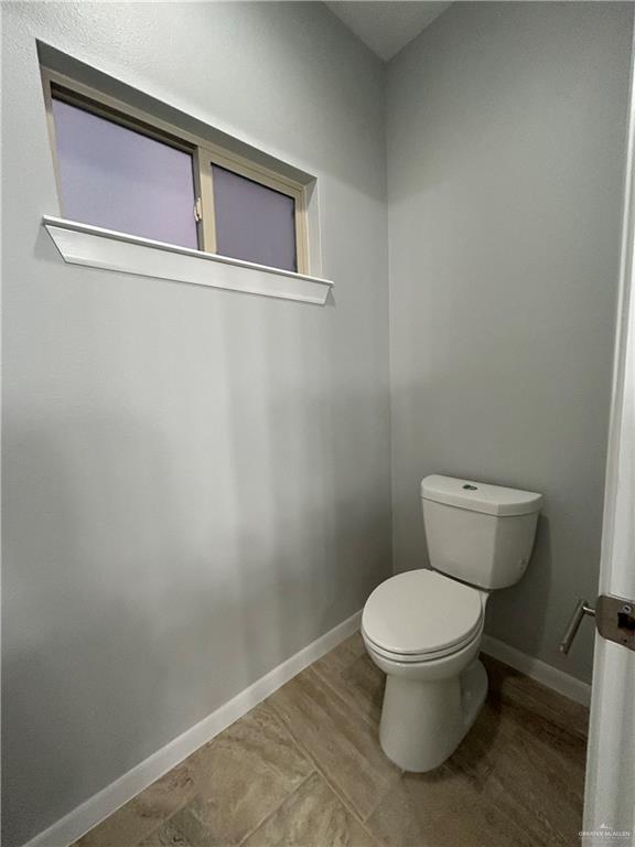 bathroom featuring toilet