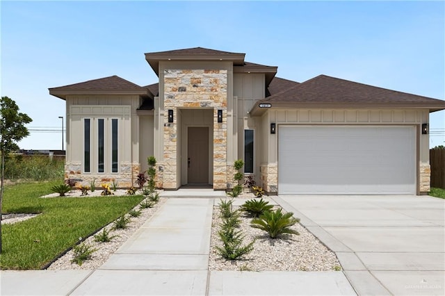 2413 N Gaytan Ave, Edinburg, TX 78542 - prairie-style home featuring stone siding, an attached garage, and roof with shingles