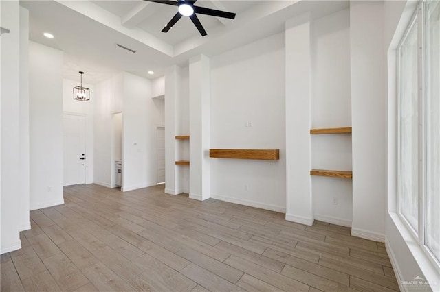 2413 N Gaytan Ave, Edinburg, TX 78542 - unfurnished room with light wood-style flooring, recessed lighting, a ceiling fan, baseboards, and a chandelier