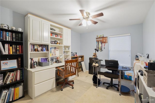 office space featuring ceiling fan