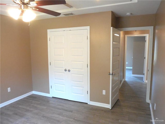 5421 San Diego Dr, Edinburg, TX 78542 - unfurnished bedroom with baseboards, a closet, wood finished floors, and ceiling fan