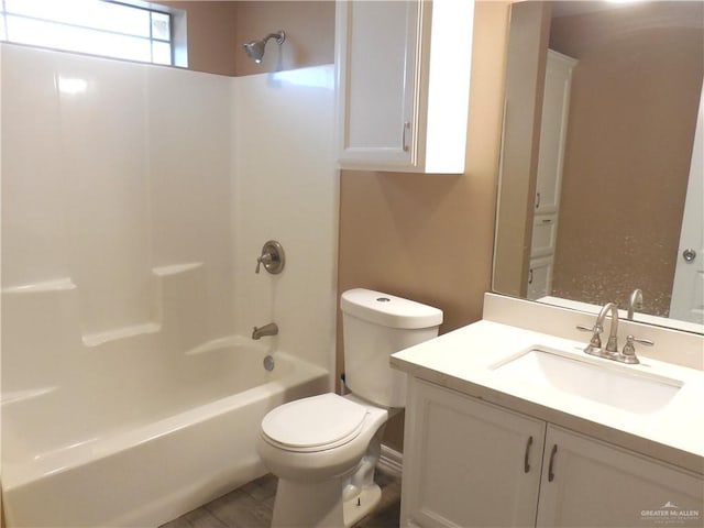 5421 San Diego Dr, Edinburg, TX 78542 - bathroom featuring toilet, vanity, and shower / bathtub combination