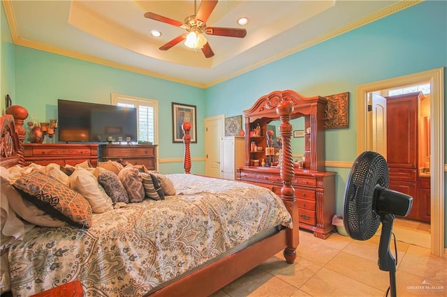 bedroom with ceiling fan, light tile patterned flooring, a raised ceiling, and crown molding