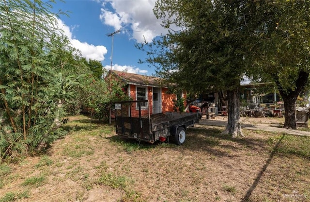 view of yard featuring a wooden deck