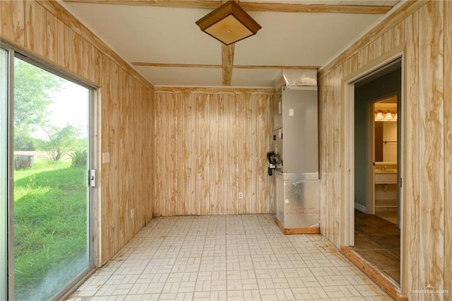 15220 Wilson Rd, Harlingen, TX 78552 - empty room with wooden walls and brick patterned flooring