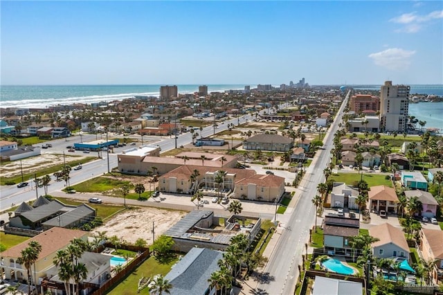 bird's eye view featuring a beach view and a water view