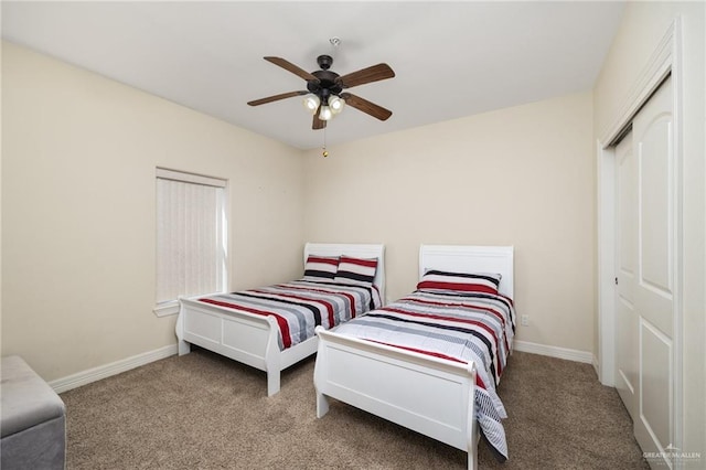 bedroom with carpet floors, a closet, and ceiling fan